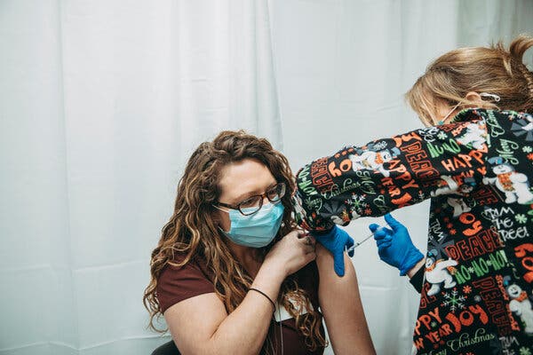 A nurse at the Jefferson Regional Medical Center in Pine Bluff, Ark., receiving a dose of the Pfizer-BioNTech vaccine in December.